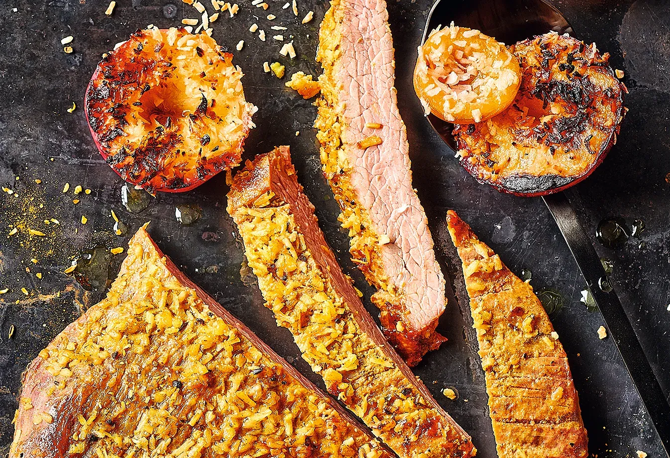 Flank steak with grilled coconut fruits. Photo: Le Menu