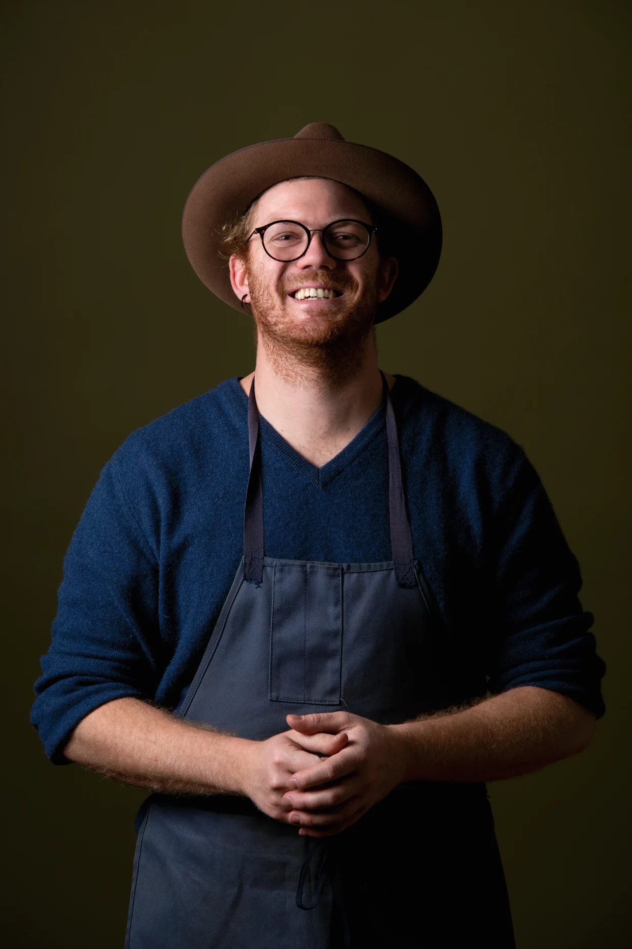 Julian Huber runs the Risa hat workshop in Hägglingen, which he saved from closure. Photo: Risa