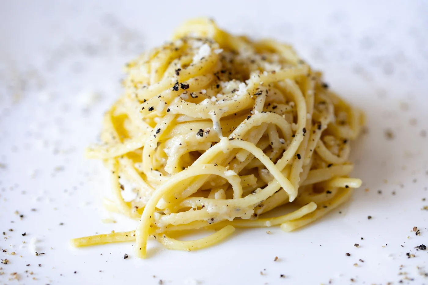 Reduced to the max: good pasta secca, properly cooked, needs little more than pecorino and black pepper. Photo: Adobe Stock